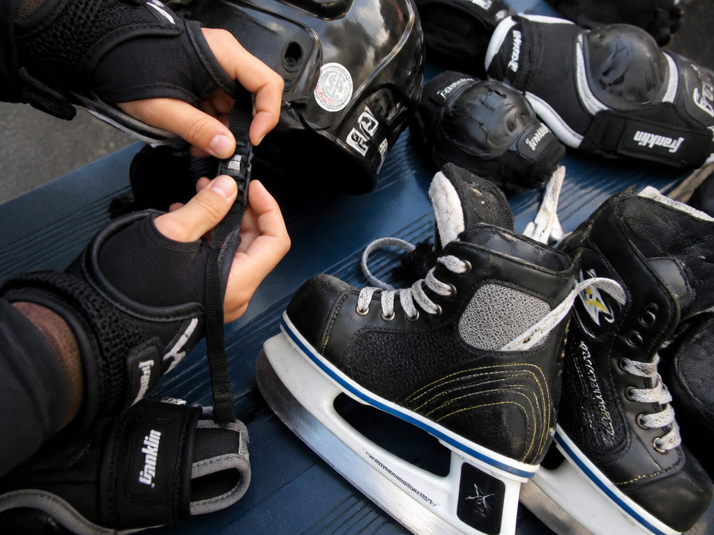 Essential protective gear for a child beginner learning how to ice skate