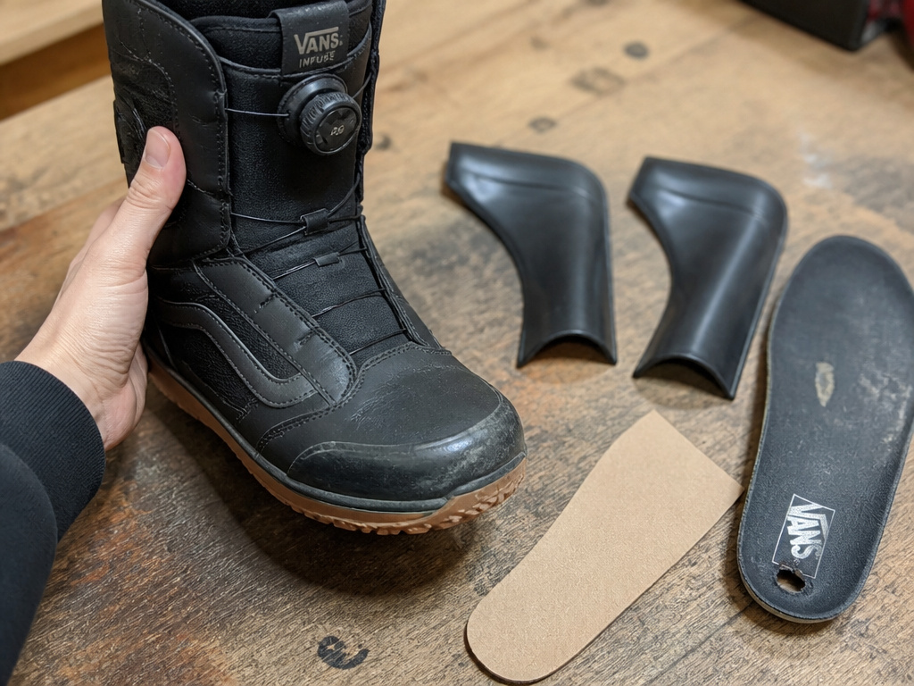 Vans Infuse boot maintenance with stiffeners and cardboard shim for durability.