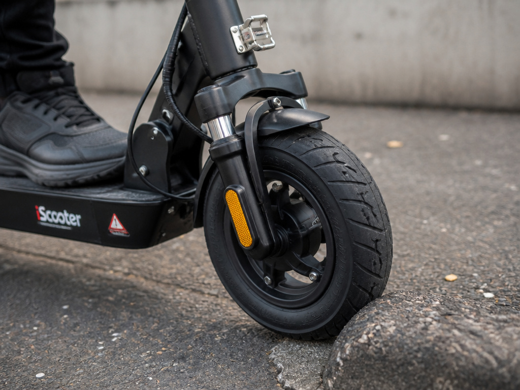 iScooter i10max front suspension compression under rider weight on rough pavement