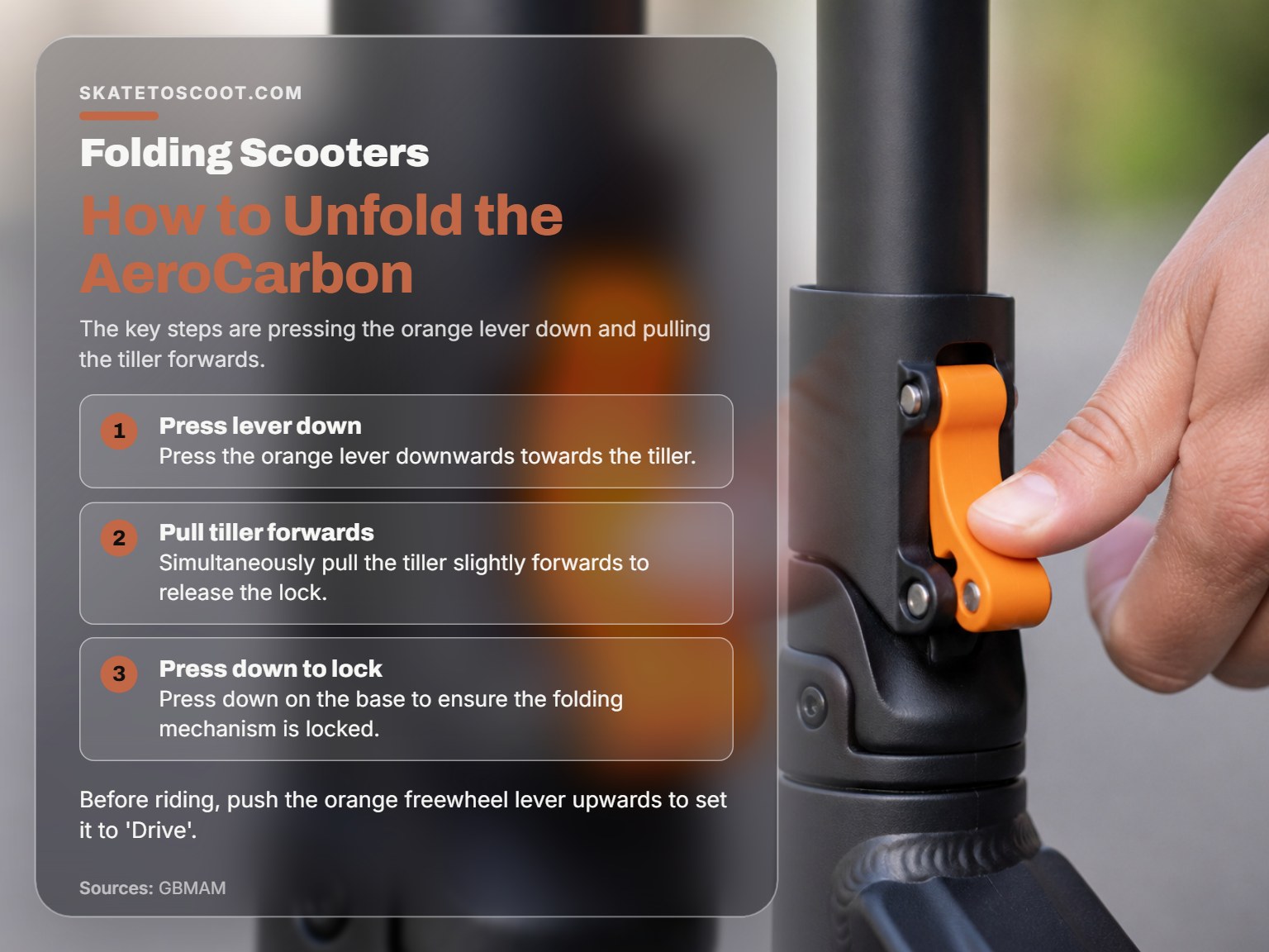 Close-up of a hand pressing the orange lever to unfold a mobility scooter.