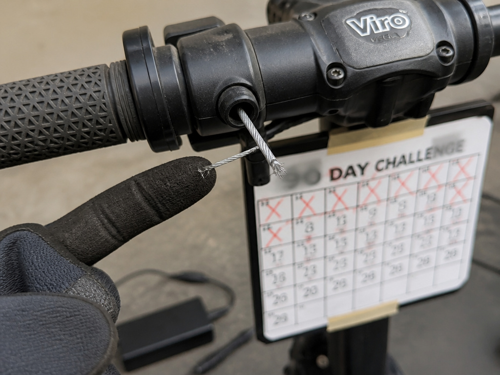 Viro Vega scooter warranty exclusions: frayed throttle cable and charger.